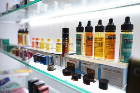 Variety of e-liquids and accessories displayed in a vape shop Sydney